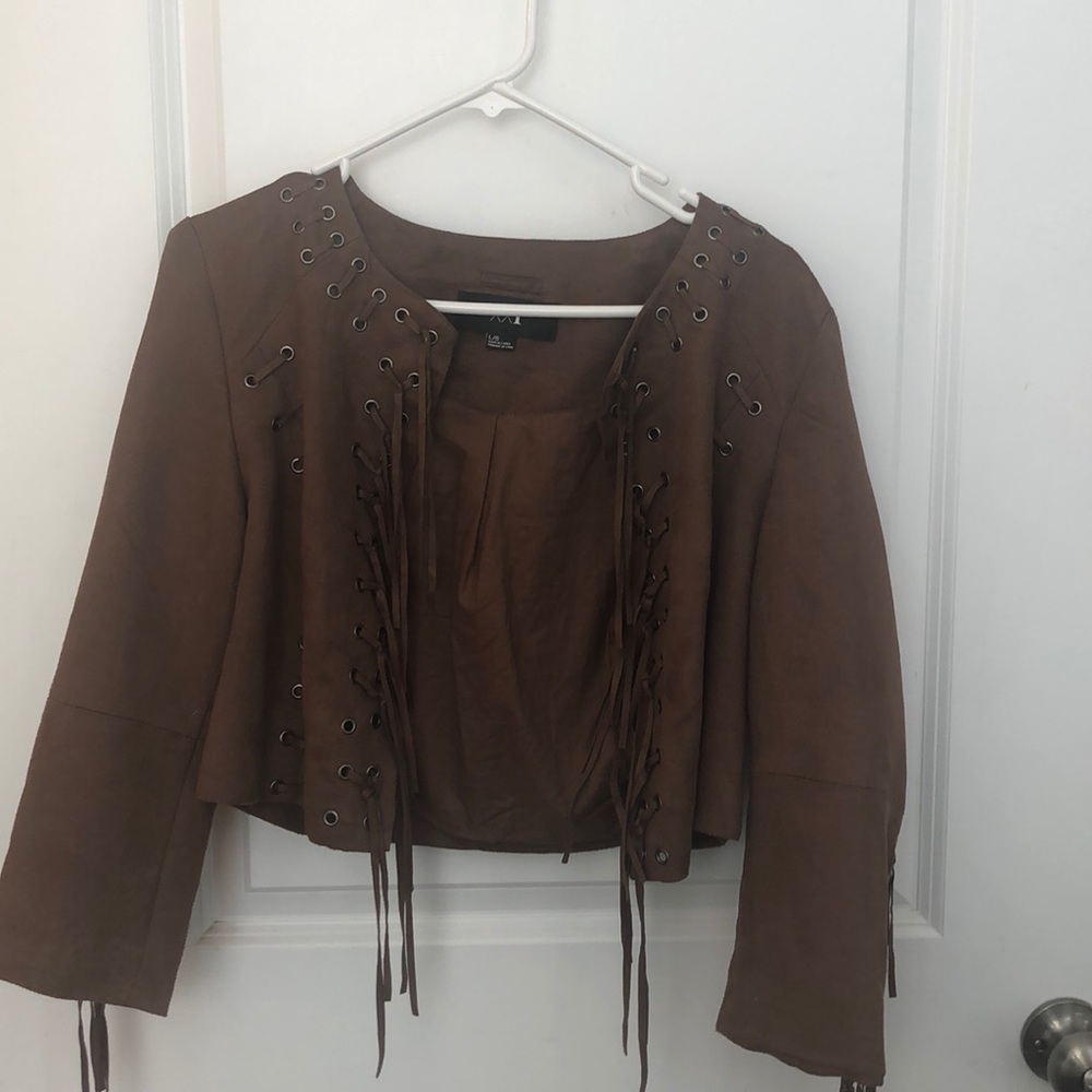brown little jacket with hardware and tassels